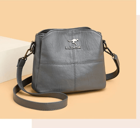 bolsa-feminina-pequena-em-couro-genuino-cangu-balidaishu-2117026 - Kabani